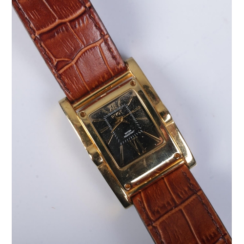 443 - A gents gilt metal Pivot quartz wristwatch, with reversible watch head. On original strap.