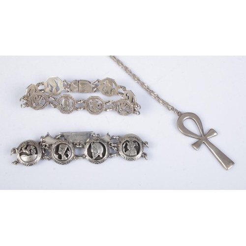 449 - Three pieces of silver jewellery, to include two Siamese link bracelets and a silver crucifix pendan... 