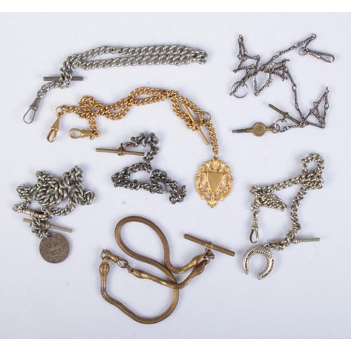 453 - Seven white and yellow metal albert chains. Includes examples with fobs, 1897 South African shilling... 