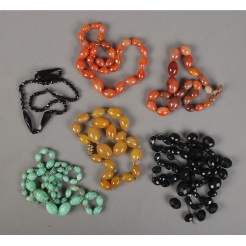 75 - Six costume jewellery bead necklaces. Includes glass and stone examples.