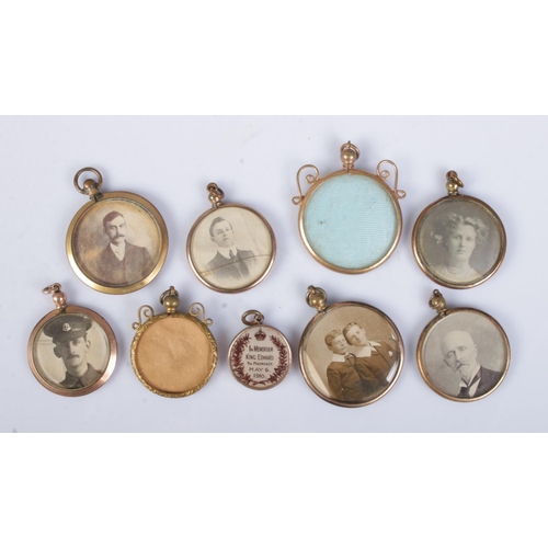 461 - Nine yellow metal photograph lockets. Includes military example, King Edward Memoriam etc.