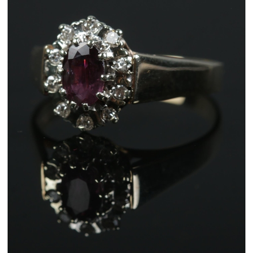 501 - A 9ct gold ruby and diamond ring. Size R 1/2. 3.2g.