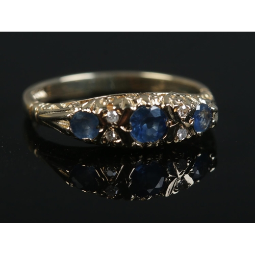 502 - A 9ct gold sapphire and diamond ring. Size M. 2.6g.