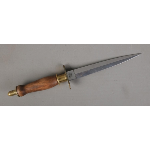 535 - J. Nowill and Sons, Sheffield double edged commando knife featuring turned wooden handle with brass ... 