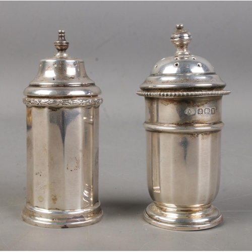 541 - Two Birmingham silver pepper pots hallmarked for 1920 (maker unknown) and 1939 by William Neale & So... 