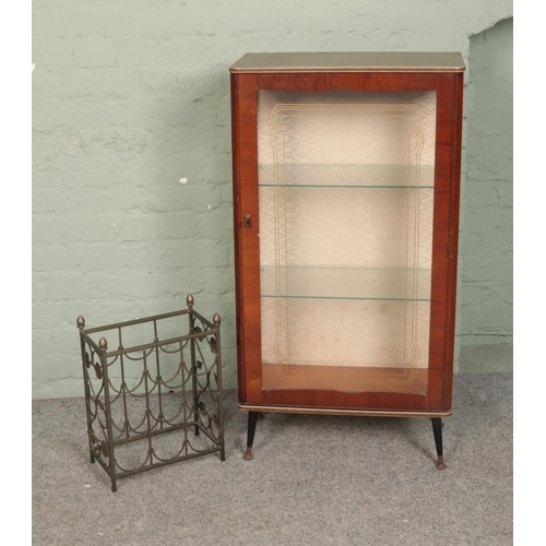 563 - A vintage two-tier glazed display cabinet raised on tapered legs along with small floral wine rack.