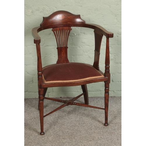 573 - An early 20th century mahogany inlaid armchair