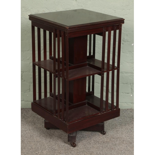 578 - An early 20th century rotating book stand.