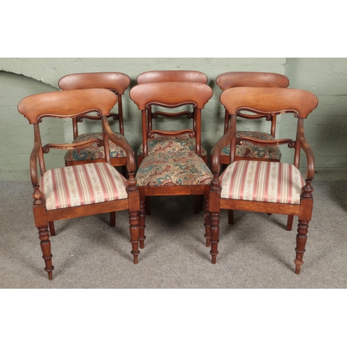 582 - A set of six Victorian carved bar back dining chairs including two carvers.