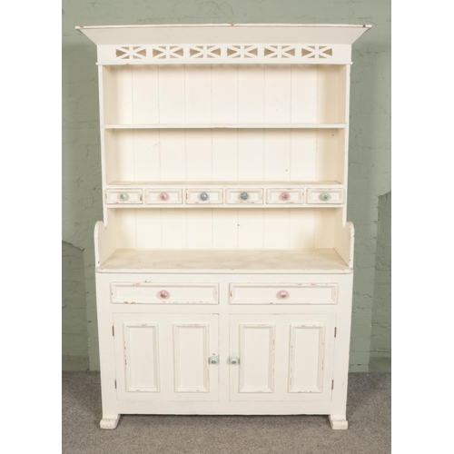 588 - A painted pine Irish dresser

Hx193cm
Wx138cm
Dx46cm