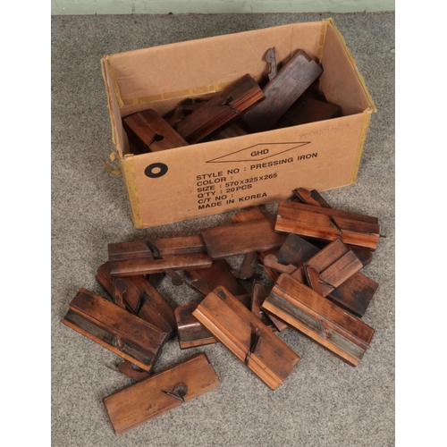 241 - A box of assorted wood working planes including examples stamped by S Copley, H Lockwood, G Coulters... 