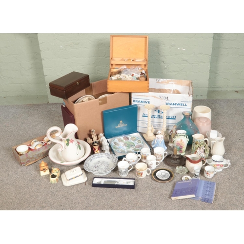 256 - A large quantity of assorted collectables mostly ceramics including Wedgwood plates, various cabinet... 