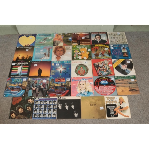 260 - A collection of mainly rock and pop vinyl records, to include The Beatles, Michael Jackson, Diana Ro... 