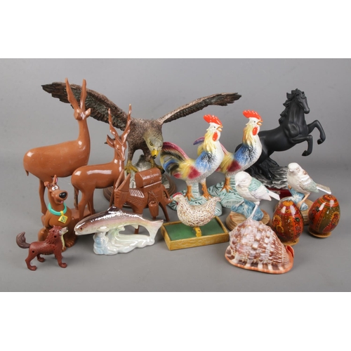 268 - A quantity of animal figures including The Juliana Collection horse, eagle figure, souvenir cockerel... 