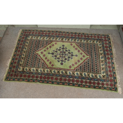 342 - A large green wool rug 

190x280cm