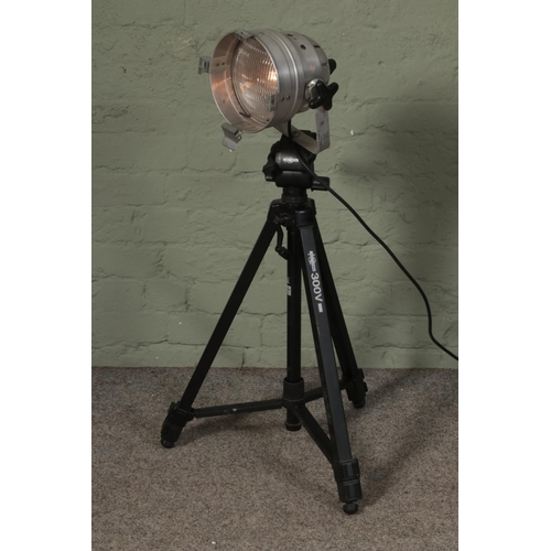 348 - A studio light on a IQ video 300v camera stand.