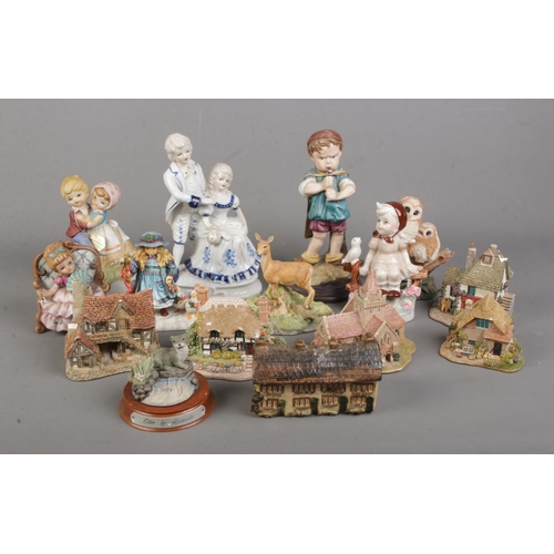 64 - A quantity of collectable figures including Lilliput lane cottages, Leonardo collection animal figur... 