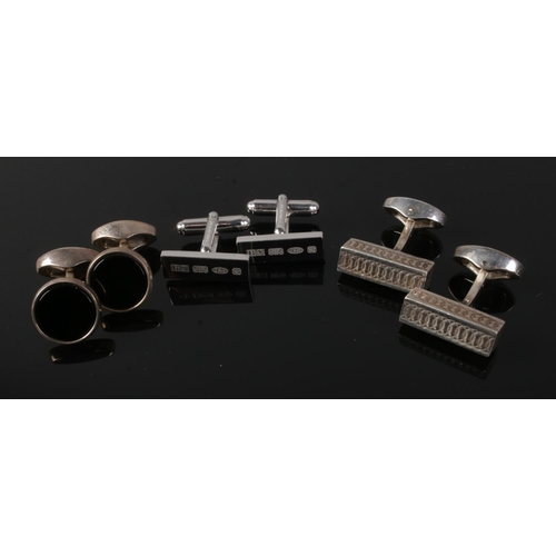 467 - Three pairs of silver cufflinks produced by Crombie and Burberry. 50.6g