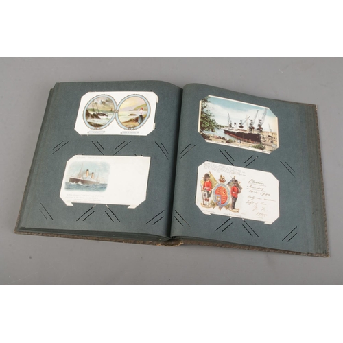 8 - An album of mostly early 20th century postcards of various themes including greetings, birthday and ... 