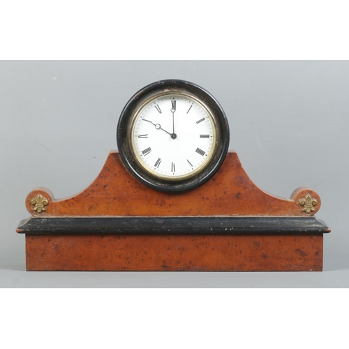 6 - A walnut and ebonised drum mantle clock, with brass Fleur de Lys to the rounded shoulders. Featuring... 