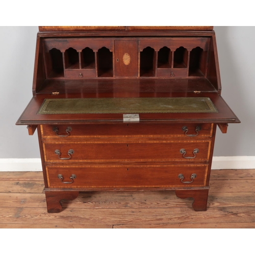 490 - An Edwardian mahogany bureau bookcase. With satinwood inlay and crossbanding. Height 208.5cm, Width ... 