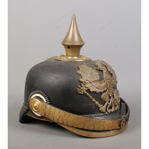 132 - A World War One Imperial German officers pickelhaube bearing eagle badge with motto Mit Gott Fur Koe... 