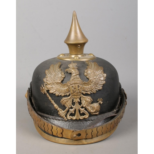 132 - A World War One Imperial German officers pickelhaube bearing eagle badge with motto Mit Gott Fur Koe... 