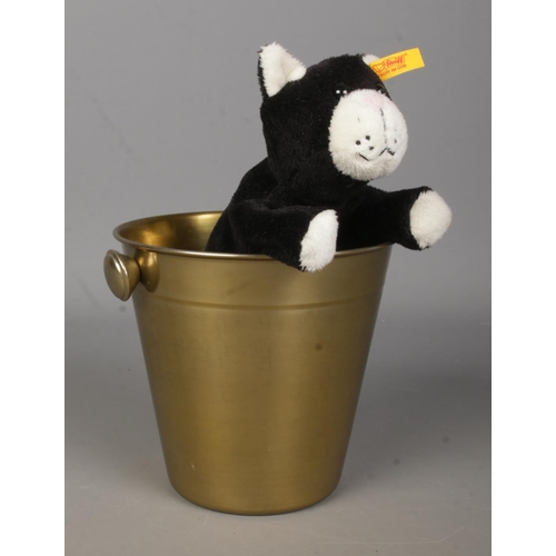 100 - A Steiff Original 'Koko' cat, 281402, in gold effect ice bucket.