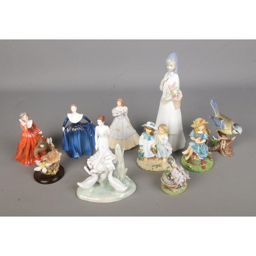 104 - A collection of assorted figures to include Nao by Lladro duck family, Coalport ladies, Country Arti... 