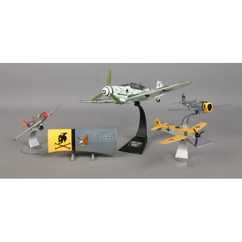12 - Four Corgi diecast model aircraft, including three Limited Edition examples. Consisting of AA34902 B... 