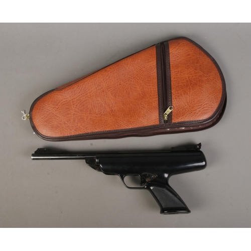 126 - A BSA Scorpion .22 calibre air pistol with leather carry case. Serial Number RB51675. CANNOT POST.