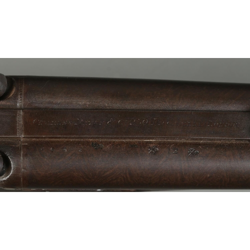 158 - A Charles Pryse & Co double barrelled cape/combination rifle. With damascus barrels and walnut stock... 