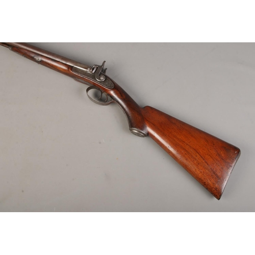 159 - A 19th Century George and John Deane side by side percussion shotgun. Muzzle loading. With thirty in... 