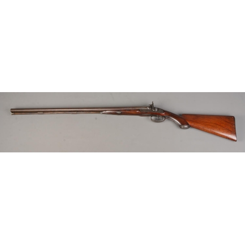 159 - A 19th Century George and John Deane side by side percussion shotgun. Muzzle loading. With thirty in... 