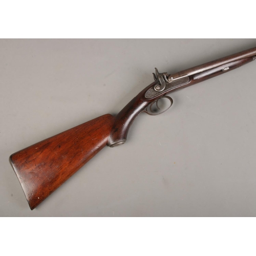 159 - A 19th Century George and John Deane side by side percussion shotgun. Muzzle loading. With thirty in... 