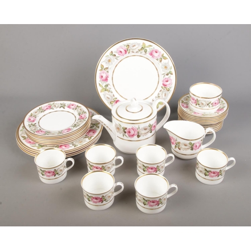 23 - A collection of Royal Worcester tea wares in the Royal Garden pattern to include tea pot, milk jug, ... 