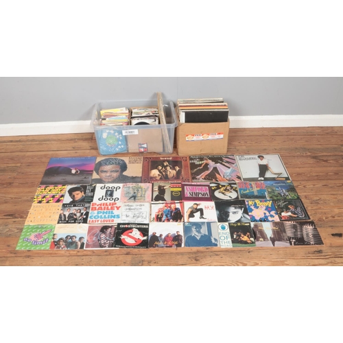 176 - Two boxes of assorted singles and LP records, to include Soft Cell, King, Jennifer Rush, The Communa... 