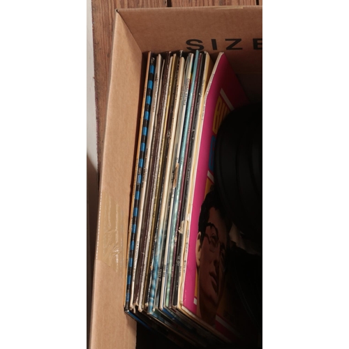 180 - A box of assorted vinyl LP records and singles of mainly pop and rock to include Michael Jackson Thr... 
