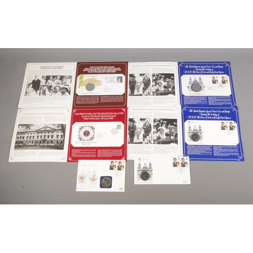 29 - A small collection of mostly Danbury mint commemorative coin covers to include The First Ever United... 
