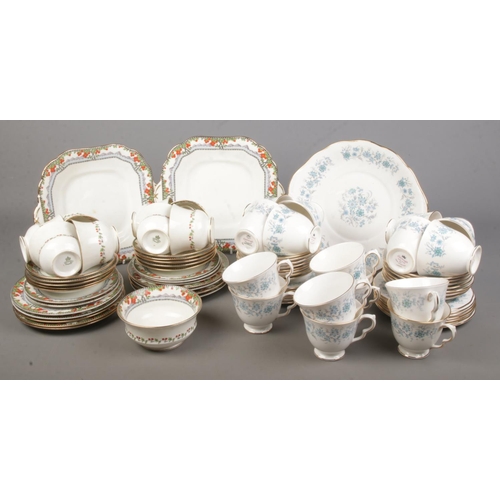 33 - A collection of bone china teawares. Includes Aynsley Orange Tree and Colclough Braganza.