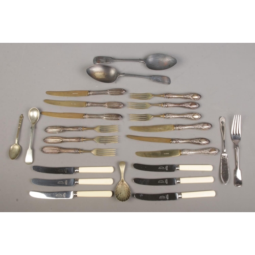 36 - A box of assorted cutlery. Includes Solingen silver handled examples, stamped 800.