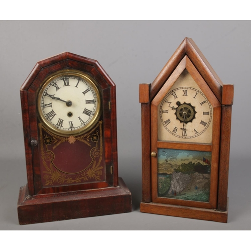 50 - Two American clocks including 8 day wall clock and mantel clock examples.