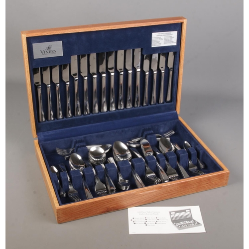 55 - A Viners oak cased canteen of Tudor cutlery. 100 pieces.