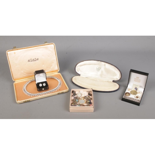 61 - A collection of mainly costume jewellery, to include a boxed pearl necklace with silver clasp, Kirks... 