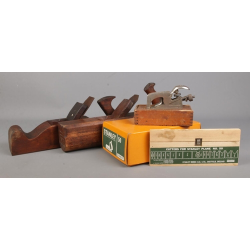 64 - Four vintage planes, to include boxed and unused Stanley No. 50 and Record No. 077A in wooden box.