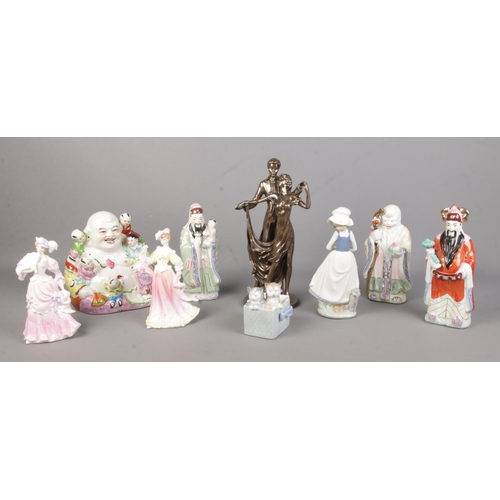 70 - A collection of ceramic and resin figures, including examples by Crosa, Leonardo Collection and Nao.