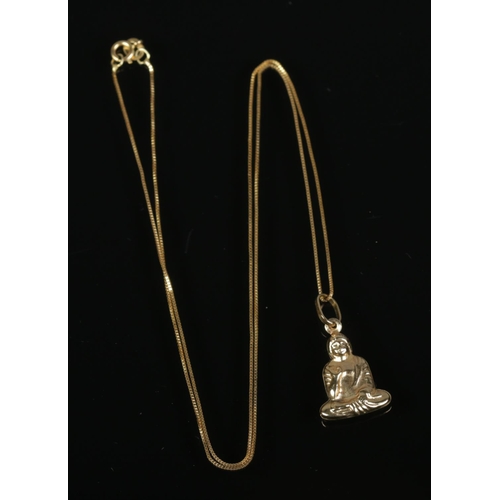 386 - A 9ct gold pendant formed as a seated goddess on chain. Total weight 1.5g.