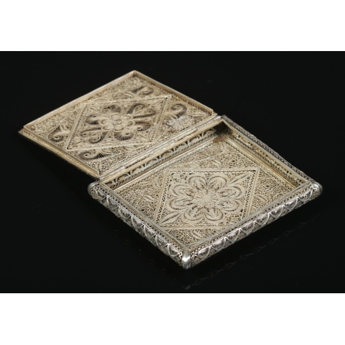 395 - A white metal filigree cigarette case, with diamond and floral design. Length: 9cm, Width: 7.5cm.