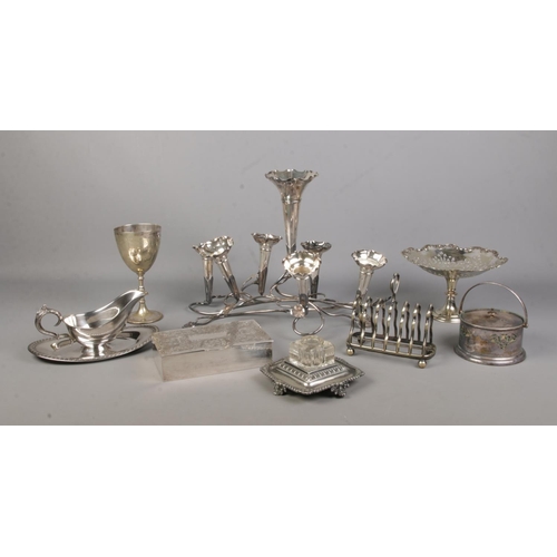 73 - A good collection of metalwares, to include epergne with seven flutes, 'Stanley Pit Pony Races' 1921... 