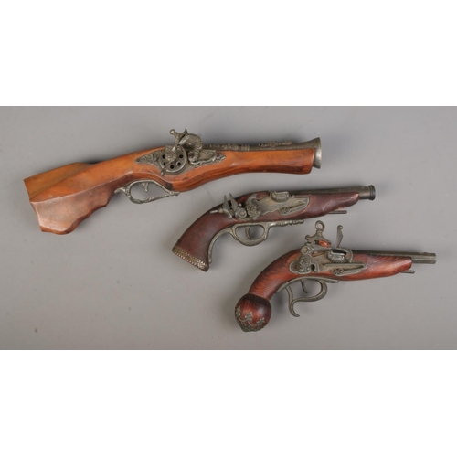 79 - Three replica Blunderbuss pistols, largest 48cm long.